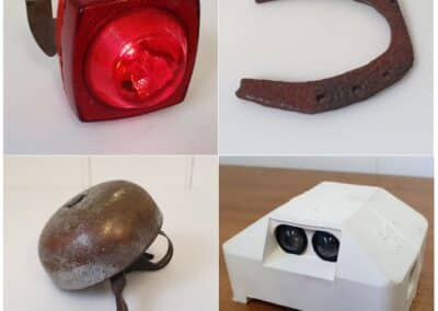 Clockwise from top left: Rear bicycle lamp, horseshoe, ‘cat’s eye’ road stud’, bicycle bell.